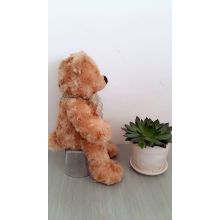 Elegant tie twist flower teddy bear