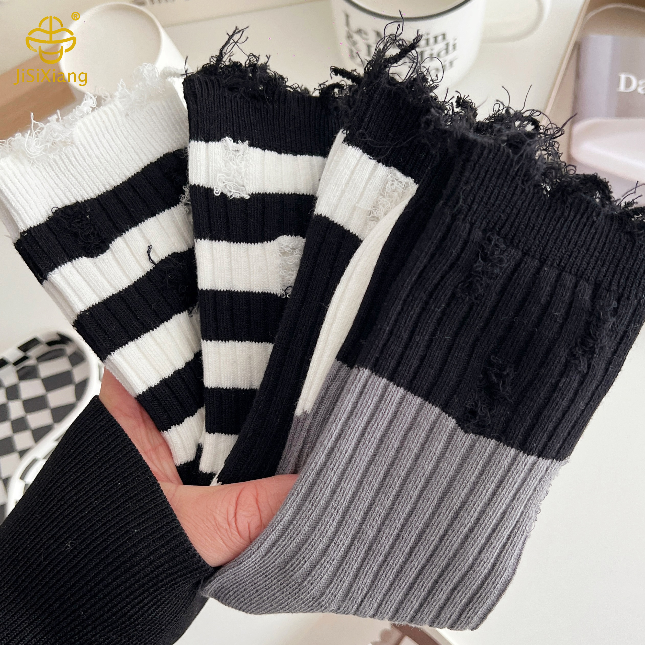 Pile of socks with black and white stripes Pile of socks with black and white stripes