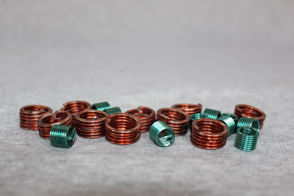 Coated thread insert