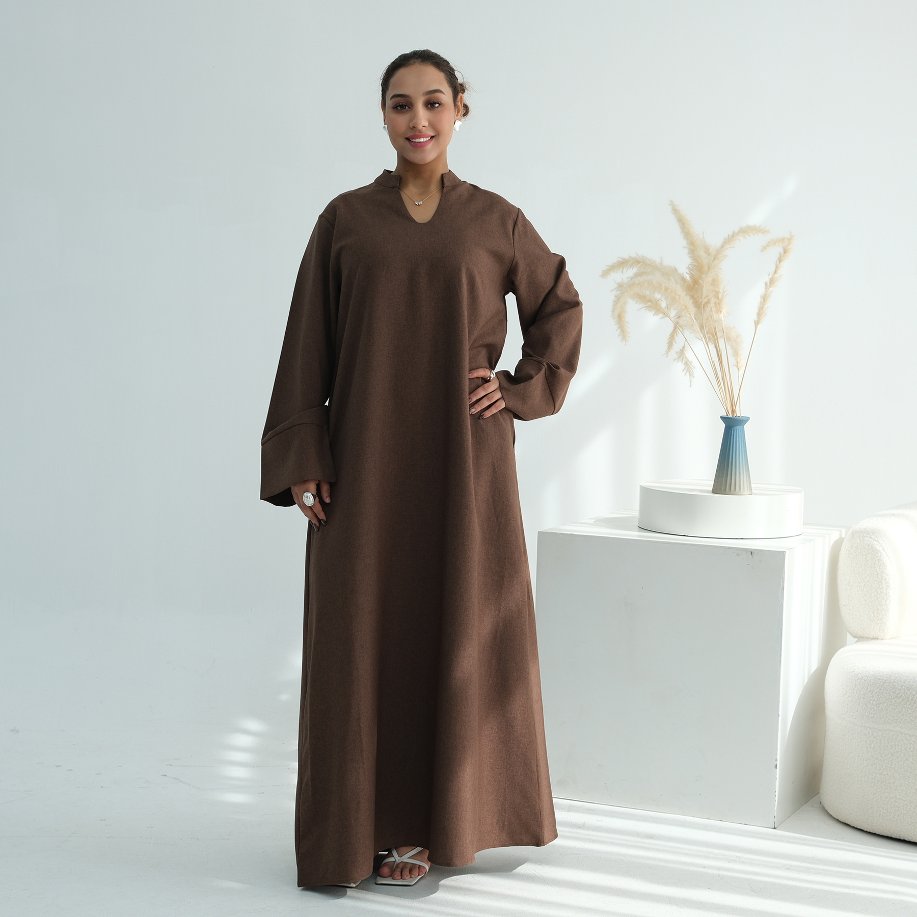 Natural Linen Abaya Fabric and Silhouette Detail Natural Linen Abaya Fabric and Silhouette Detail