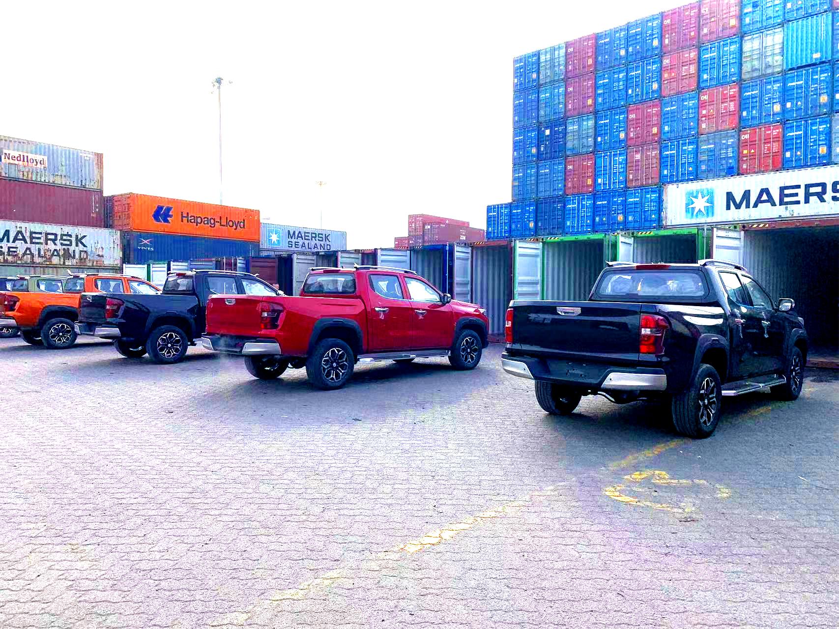 Batch delivery of pickup trucks