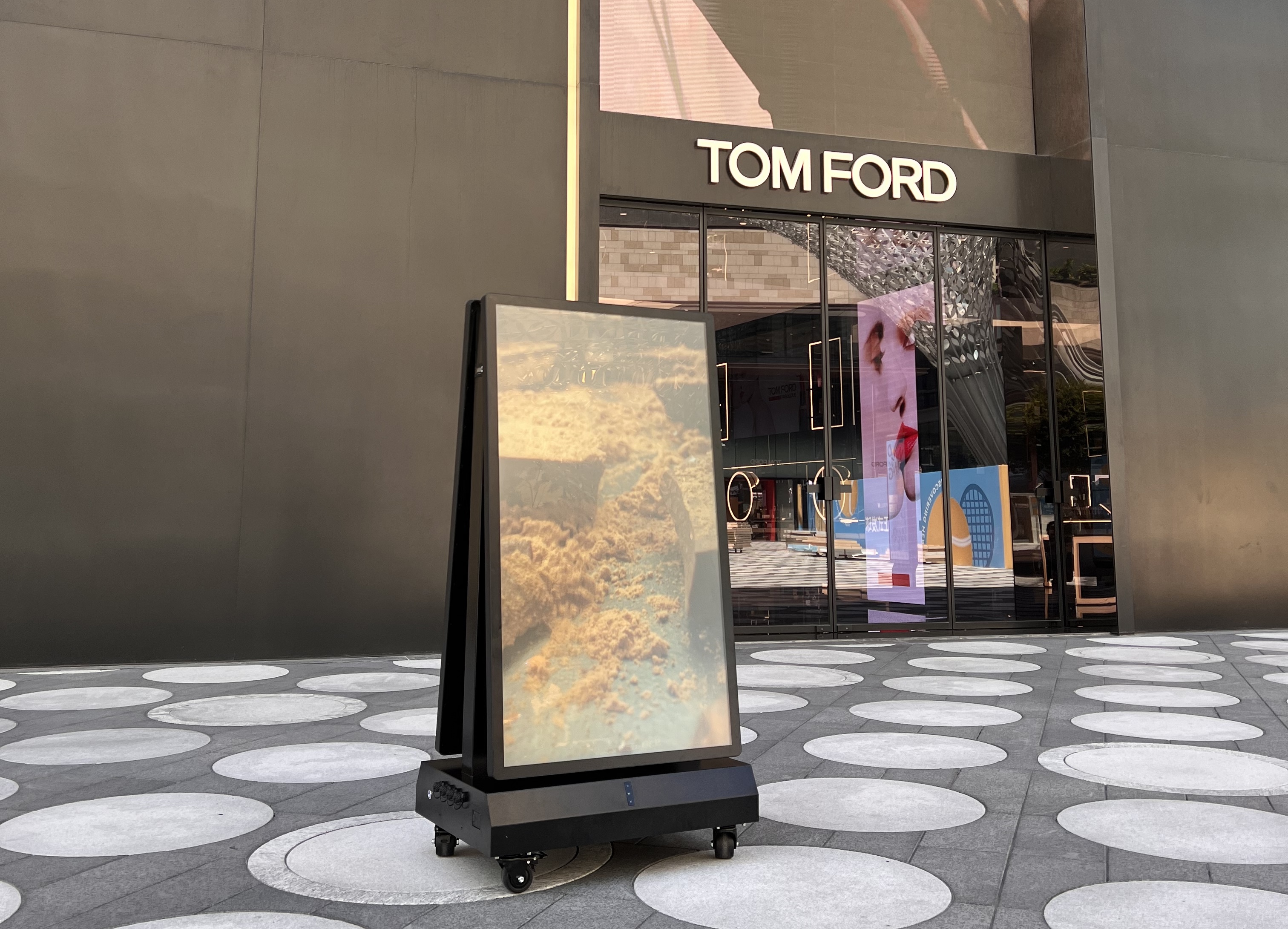 motorized tilt adjustment for outdoor digital signage