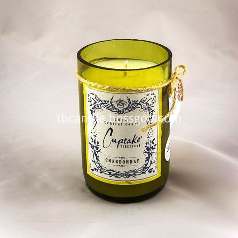 scented soy candle in wine bottle with incline cut bottom