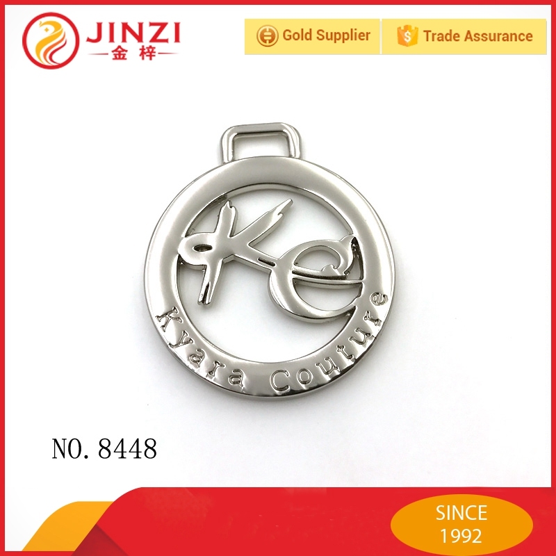 China Top Ten New Design Logo Tag Metal Label Medal