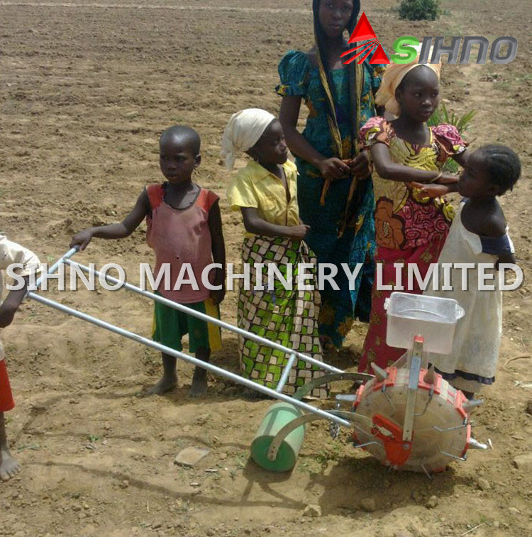 Hand Pushing Walking Manual Corn Seeder/Planter for Beans/Maize