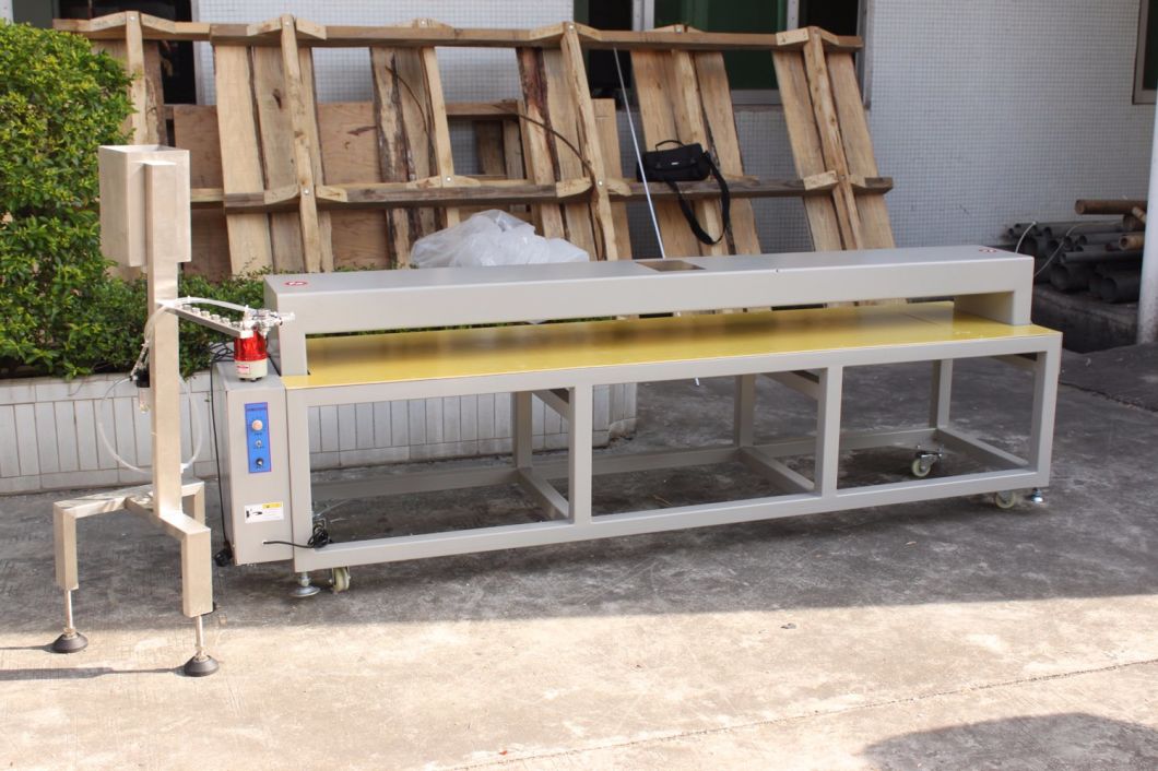 Auto-Conveying Needle Detector for Non-Woven Fabrics