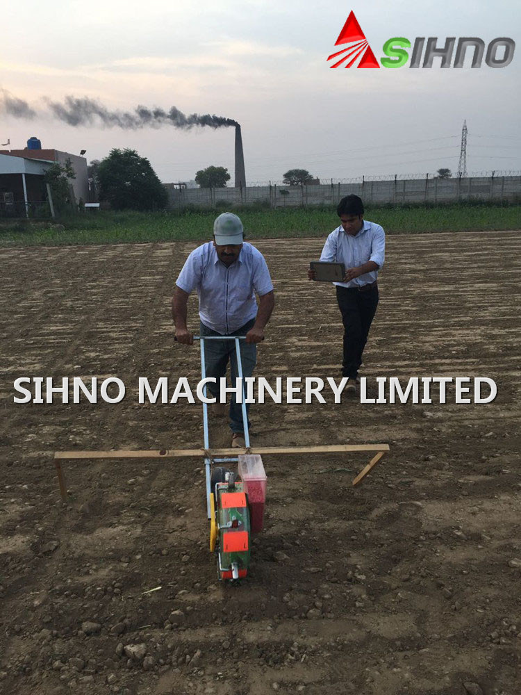 Walking Behind Hand Push Manual Seeder for Corn/Bean/Peanut/Vegetable