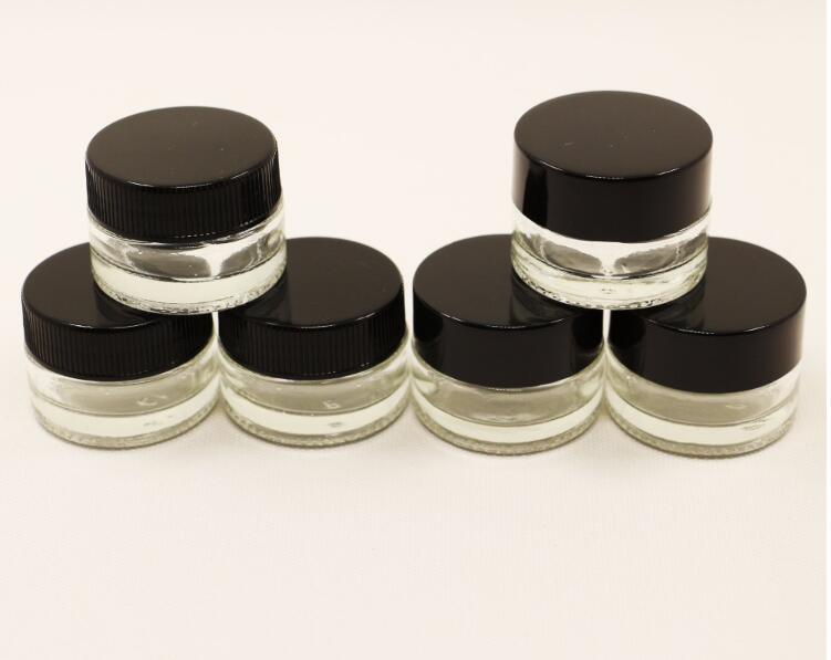 Transparent Glass Cosmetic Bottle with Black Plastic Lid