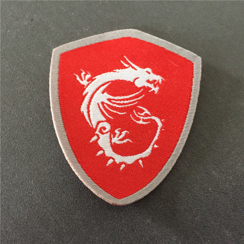 Custom 4.5cm Width with 5.2cm Hight Fancy Cutting Woven Patch