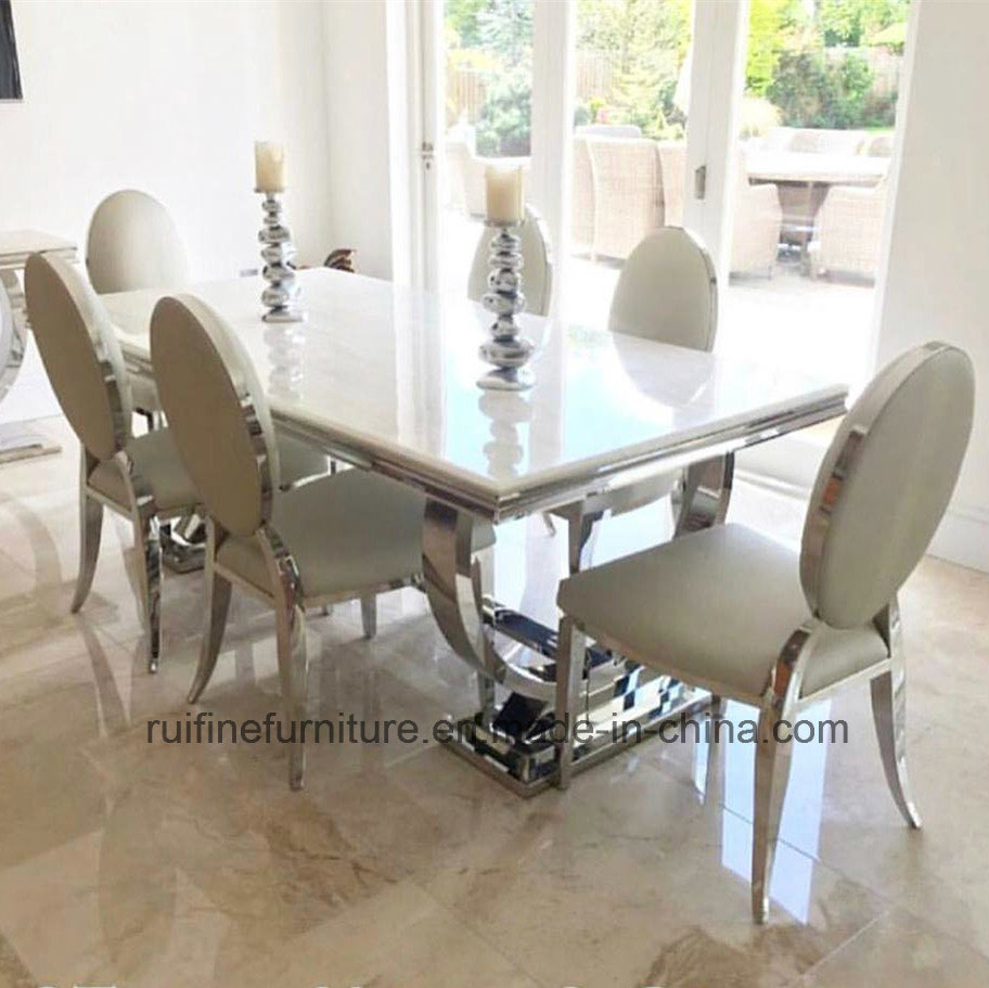 Modern Solid Marble Dining Table Stainless Steel and Italian Cream Velvet Fabric Chairs