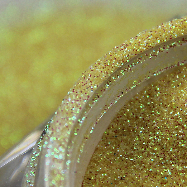 a Golden Glitter Powder Decorated with Nails