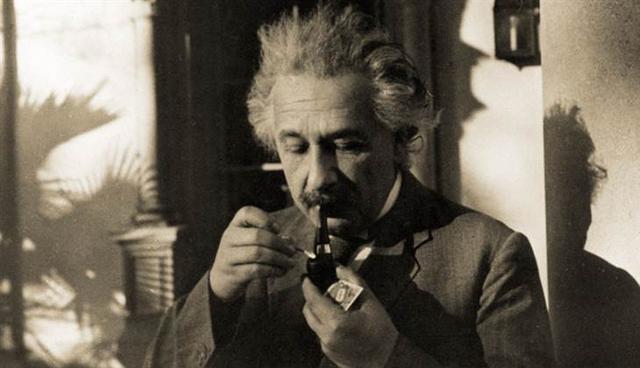 Einstein pumping British billiard bent pipe, Lee Vancliffe Peterson military plug, with reading glasses