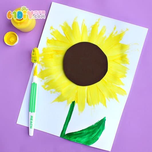 Child painting toothbrush painting sunflower