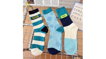 Korean style fabric logo contrasting mid tube socks with striped socks