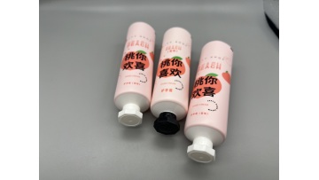 pink hand cream tube with octagonal cap 