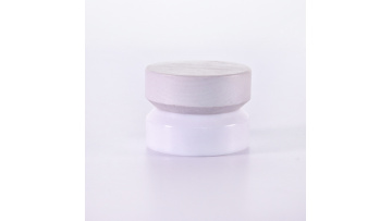 Oblique shoulder white glass jar with wooden lid