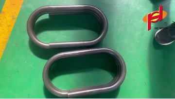 Coil bending machine