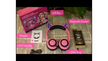 deep pink cat ear shap headphone glowing for kids.mp4