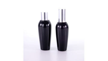 Special-shaped black glass bottle with sliver cap