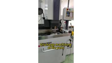 Discharge machining of die parts