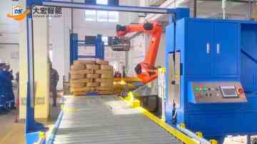 Stretch wrapping and strapping production line