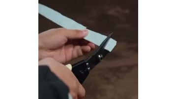 Blue and yellow industrial scissors