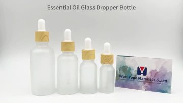 frosted glass dropper bottle with wood grain cap