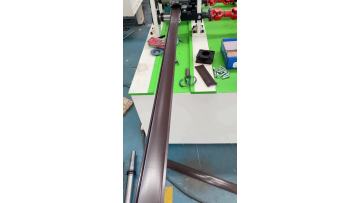 Rolling shutter door forming machine