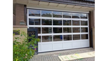 Frameless glass garage door