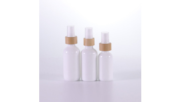 White glass bottle with bamboo mist sprayers