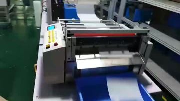 Flying Man brand desktop non-woven fabric roll to sheet cutting machine.mp4