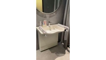 Height adjustable wash hand basin
