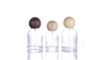 Manufacturers Wholesale High Quality 30ml 50ml Round Wooden Lid Press Head Transparent Perfume Glass Empty Bottle1
