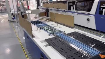 Fully Automated Clothing Folding & Stacking: 5000 Garments/Day in Action!