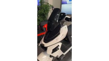 Electric Bike with Futuristic Black Windscreen Appeal