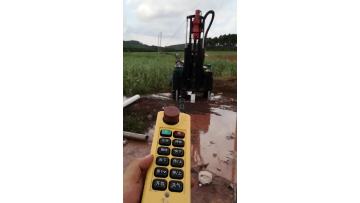 tractor drilling machine remote control at worksite.mp4