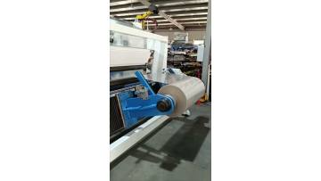 Double Axis Center Surface Slitting Rewinder