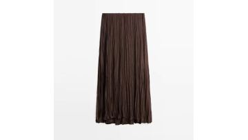 Women's flowing and elegant pleated half length skirt