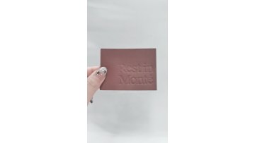 Press letter-shaped leather label