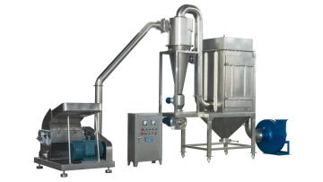 Oil Material Grinder is grinding  coriander seeds
