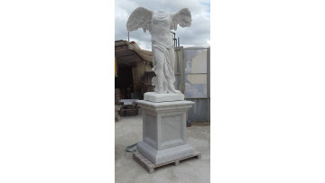 Elegant Handcrafted Marble Statue with Feathery Wings