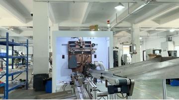 Vertical rotary screen printing machine for round objects