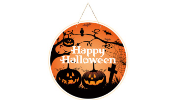 Festival themed pumpkin scene with door hanging wa