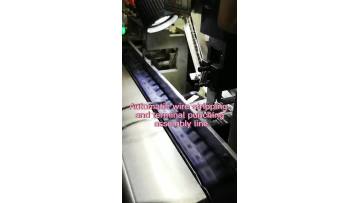Automatic wire stripping and terminal punching ass