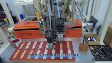 Assembly of hardware and injection molded parts