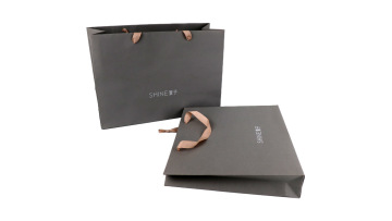 white paper bag with handle