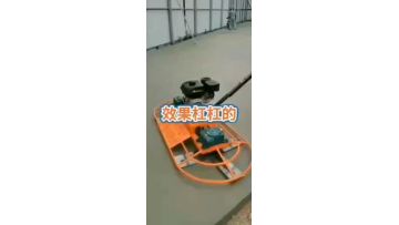 Hand-held double-disc trowel