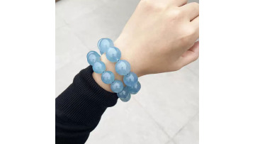 This bracelet features beautiful beads or stones