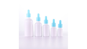 Opal white glass bottle with sky blue dropper