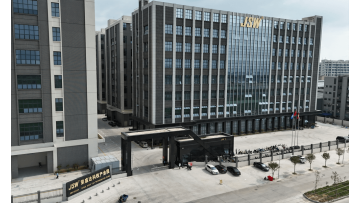 Exterior view of Huizhou Jiansheng Rongye Company, showing increased investment in research and development.